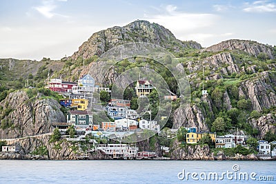 Wooden residential house built on steep hills of St. John`s, New Stock Photo