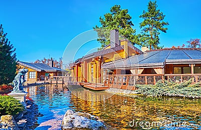 The wooden restaurant on the lake Stock Photo