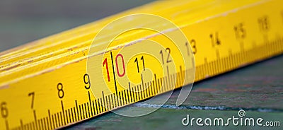 Wooden retro folding ruler, work tool banner Stock Photo