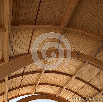 Wooden roof on a modern building. Stock Photo