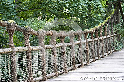 Wooden rope bridge Stock Photo