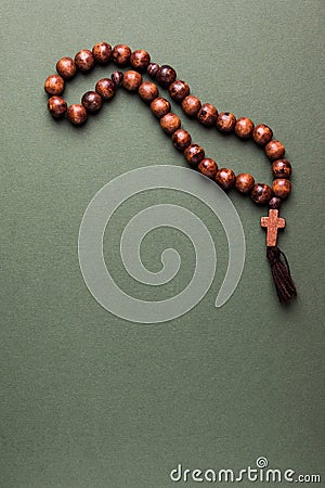 Wooden rosary and cross Stock Photo