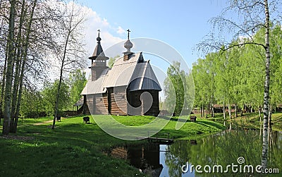 Wooden Russian ancient church made of wood Stock Photo
