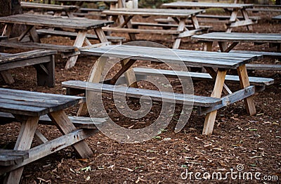 Wooden rustic benches/outdoor restaurant patio Stock Photo