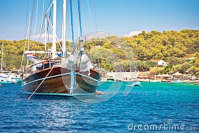 Wooden sailboat in turquoise bay of Hvar archipelago, Palmizana in Pakleni Otoci islands Stock Photo