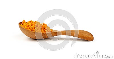 Wooden scoop spoon full of yellow turmeric powder Stock Photo