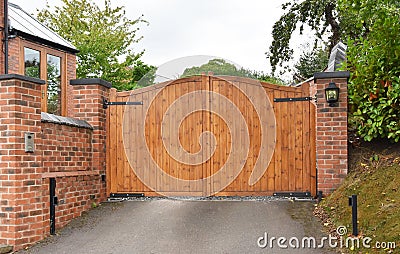 Wooden security gate with keypad lock Stock Photo