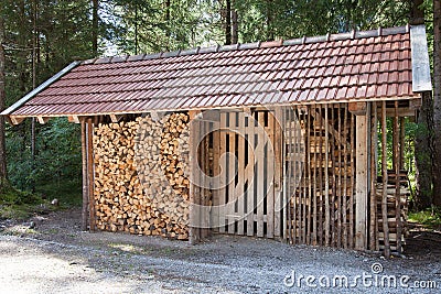 Wooden shack used for storage of firewood Stock Photo