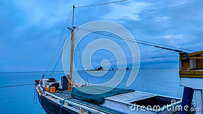 Wooden ships dock at the people's harbor in Arfai Manokwari. Stock Photo