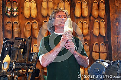 Wooden shoe maker in Amsterdam Editorial Stock Photo