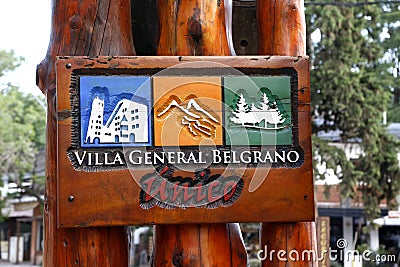 Wooden sign of the city of Villa General Belgrano in Calamuchita. Cordoba Argentina. Carved poster. Oktoberfest beer festival nati Editorial Stock Photo