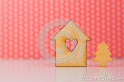 Wooden sign of house with hole in form of heart and little Chris Stock Photo