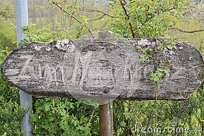 wooden sign to the hilltop cross: Maarkreuz Stock Photo