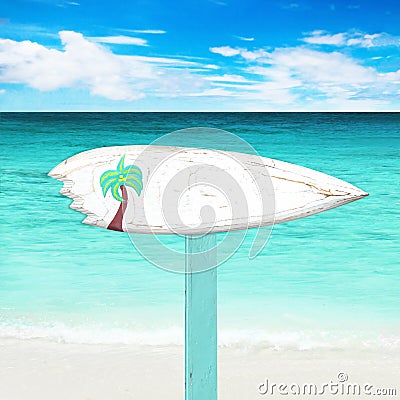 wooden signboard on the beach Stock Photo