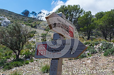 Wooden signpost for hikers in Mallorca along the GR 221 Stock Photo