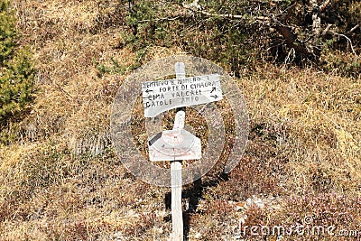 Signpost in mountains in Alps Stock Photo