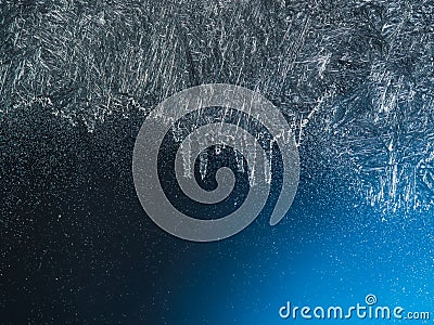 Wooden sill and frozen window. Christmas or New Year background Stock Photo