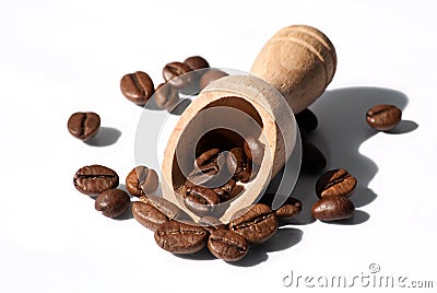 Wooden spoon and Coffee beans Stock Photo