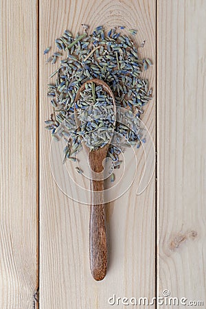 Wooden spoon with green tea milk ulun. wood background Stock Photo
