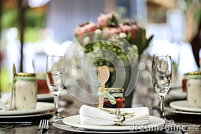 Wooden spoon and jar of jam as table decoration Stock Photo