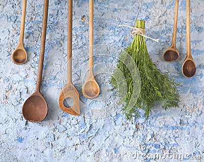 wooden spoons w. dill herbs Stock Photo