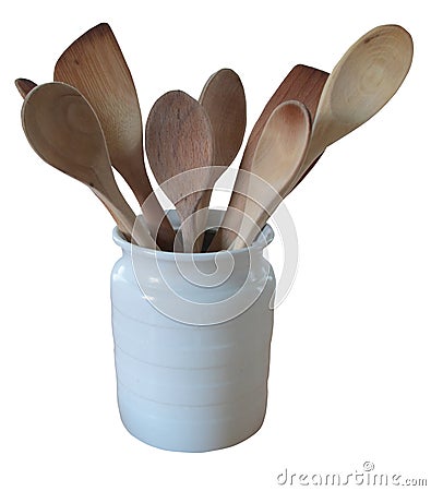 Wooden spoons in white jug Stock Photo