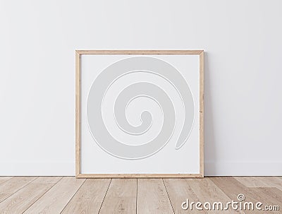 Wooden square frame Standing on parquet floor with white background, minimal frame mock up interior Stock Photo