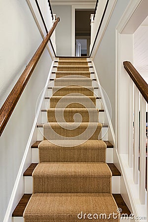 Wooden staircase and banister Stock Photo