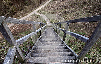 Wooden stairway leading down Stock Photo