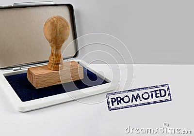 Wooden stamp PROMOTED Stock Photo