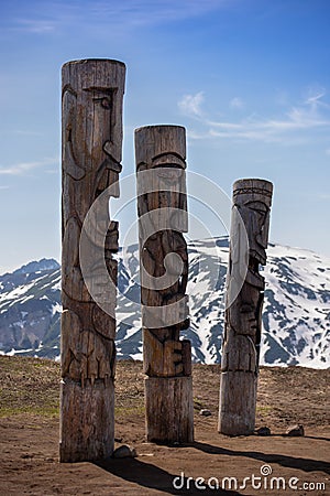 Wooden statues on the Vilyuchinsky pass in June, Kamchatka Peninsula, Russia Editorial Stock Photo