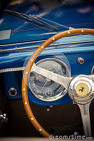 Wooden steering wheel of a vintage Ferrari Editorial Stock Photo