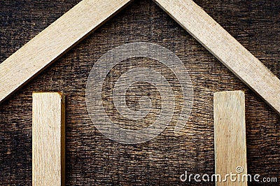 Wooden sticks forming a sketch house Stock Photo