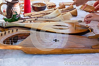 Wooden stringed instruments wooden lute and harp close-up Stock Photo