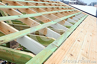 The wooden structure of the building. Wooden frame building. Wooden roof construction. photo for home. house building. Stock Photo