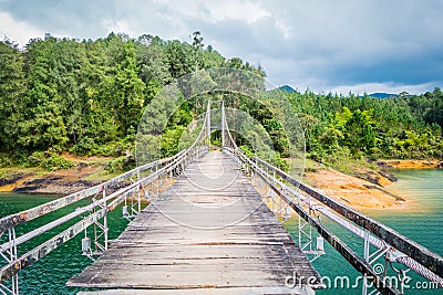 Wooden suspension bridge in Guatape, Colombia Stock Photo