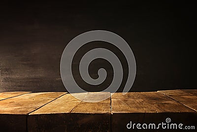 wooden table and blackboard background. Ready for product display montage Stock Photo