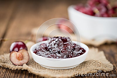 Wooden table with Cherry Jam, selective focus Stock Photo