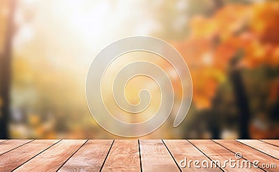 Wooden table in front of blurred autumn forest background with bokeh sunlight. Stock Photo