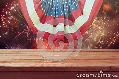 Wooden table over fireworks. 4th of July background. Independence day celebration Stock Photo