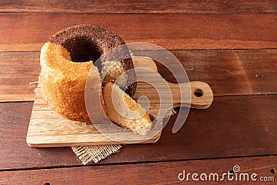 Wooden table with typical Brazilian Festa Junina foods. Cake Stock Photo