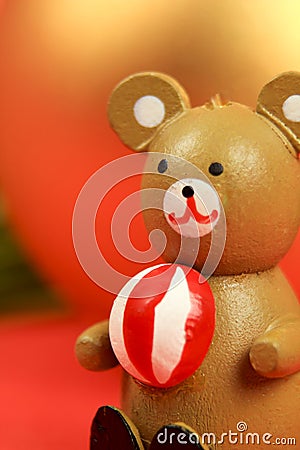 Wooden teddy bear with Christmas decoration Stock Photo