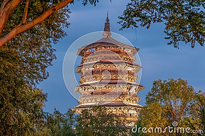 Wooden tower ( Sakya pagoda ) in night Stock Photo