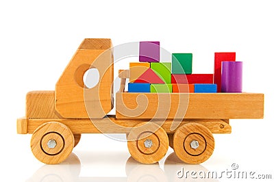 Wooden toy car with colorful blocks Stock Photo