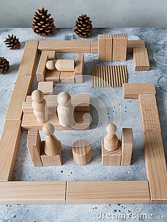 Wooden Toy Construction with ecologically wooden blocks manufactured from sustainable timbers. Wood elements for kids mental Stock Photo