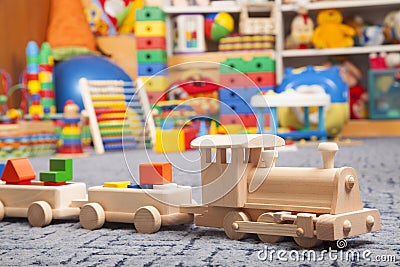 Wooden train in the play room Stock Photo