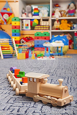 Wooden train in the play room Stock Photo