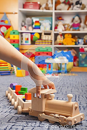 Wooden train in the play room Stock Photo