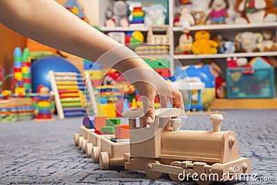 Wooden train in the play room Stock Photo