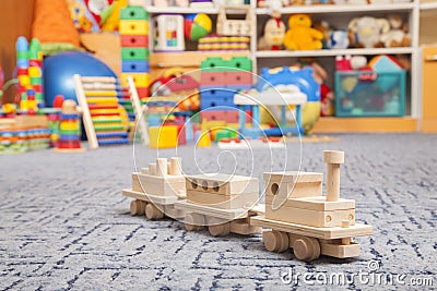 Wooden train in the play room Stock Photo